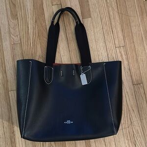 Slightly loved coach tote purse..used only twice